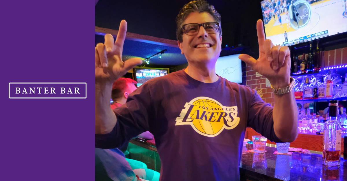 Man Smiles in Lakers Shirt at Banter Bar West Los Angeles